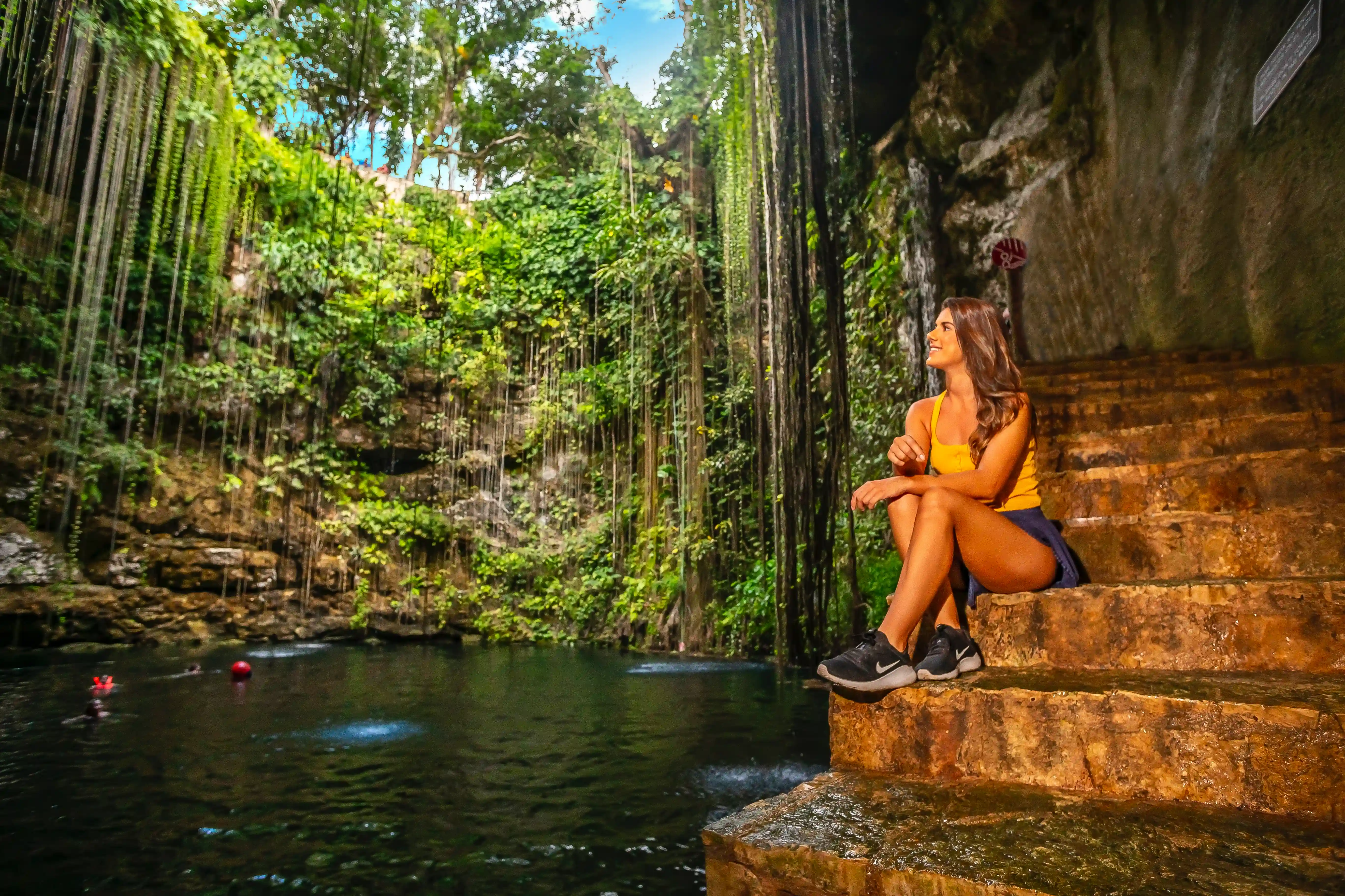 Nice girl in cenote at Chichen-Itza